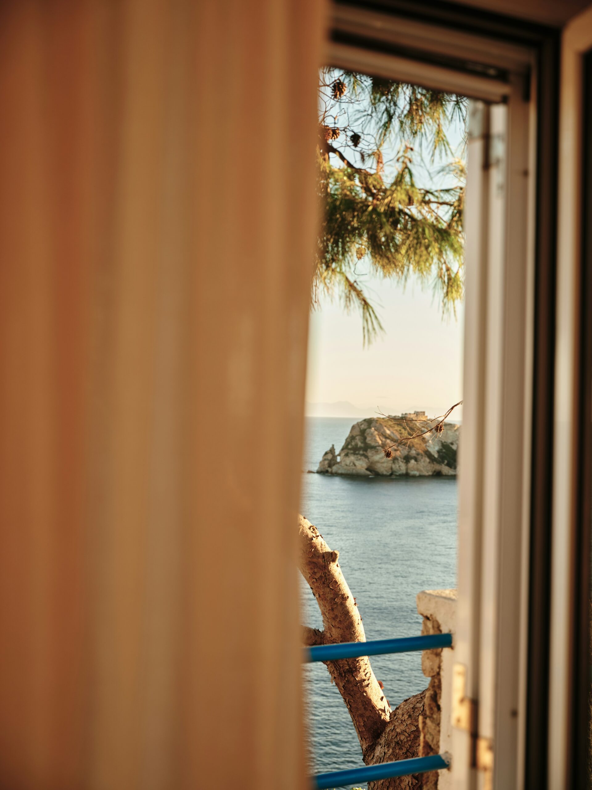 Photo for instagram of a beach outside a window