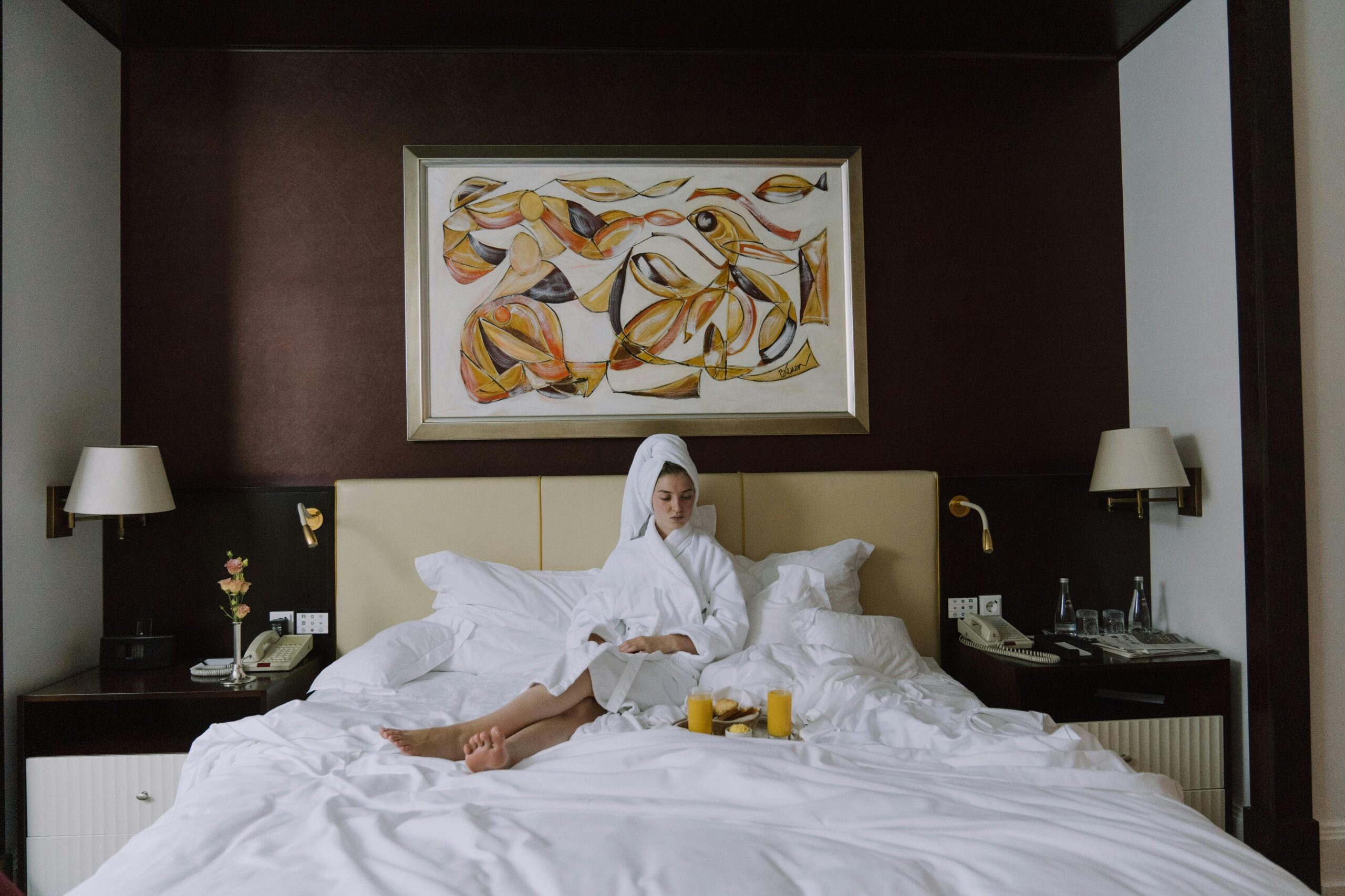 Influencer having breakfast in bed