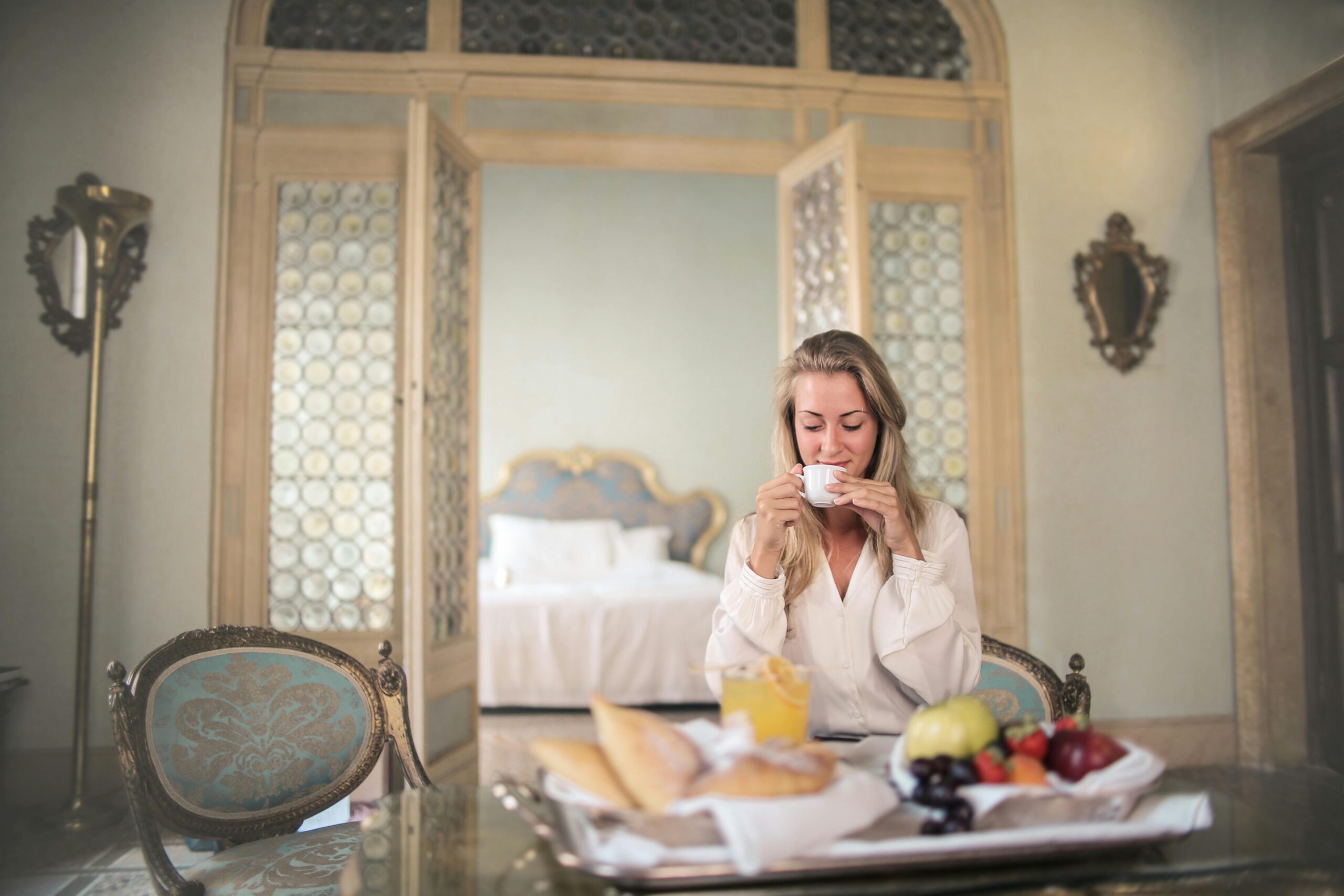 Influencer drinking tea in room