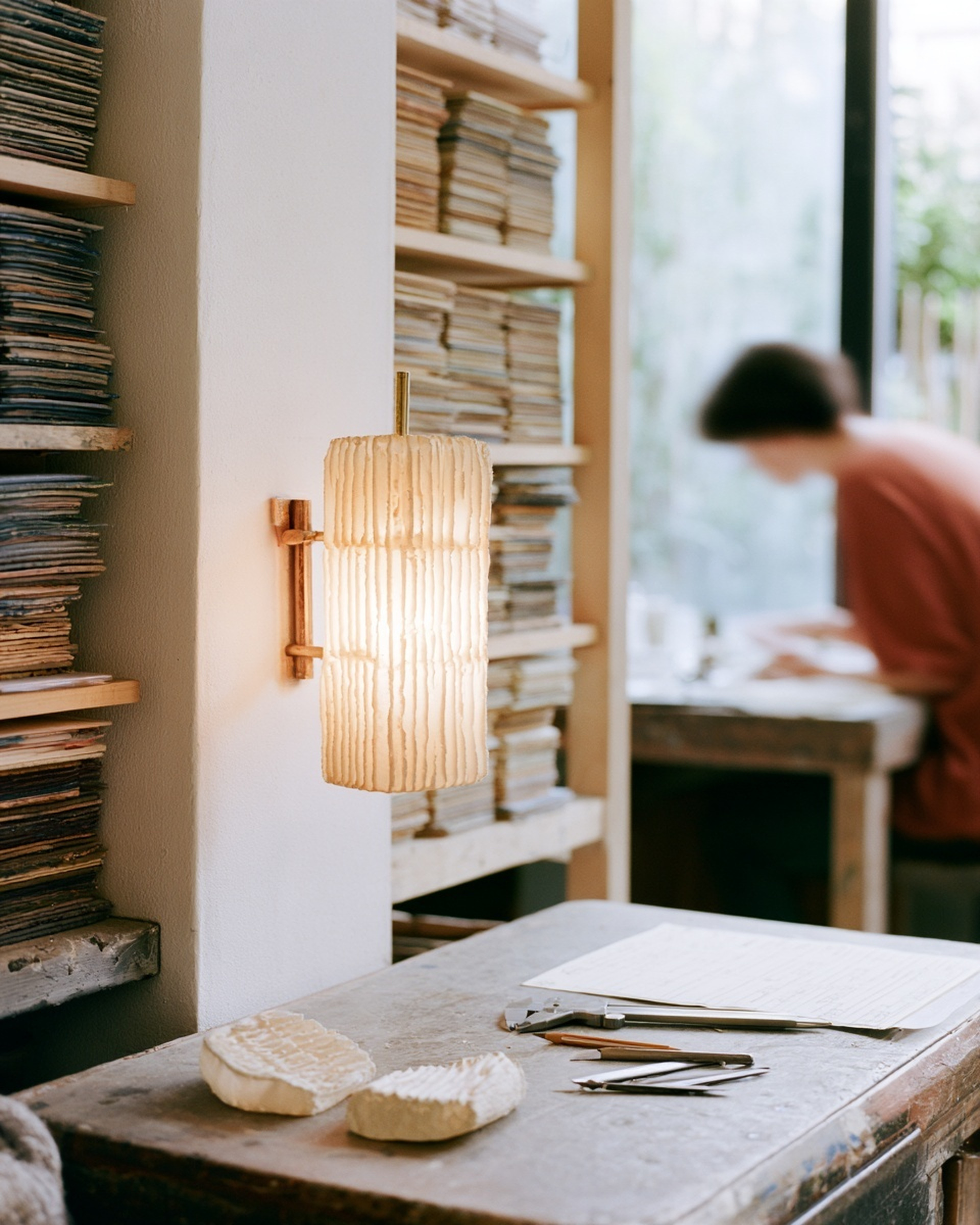 Specialist lighting studio with a custom fixture, materials and design work